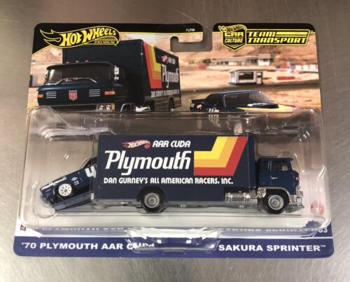 HOT WHEELS TEAM TRANSPORT HAULER ‘70 PLYMOUTH AAR CUDA & SAKURA SPRINTER 1/64