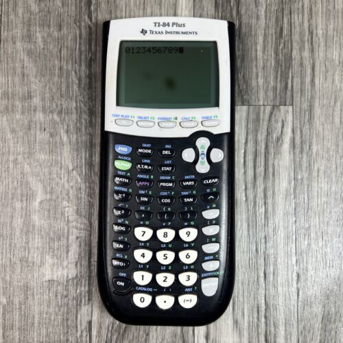 Texas Instruments TI-84 Plus Graphing Calculator Working – Small Dark Spot