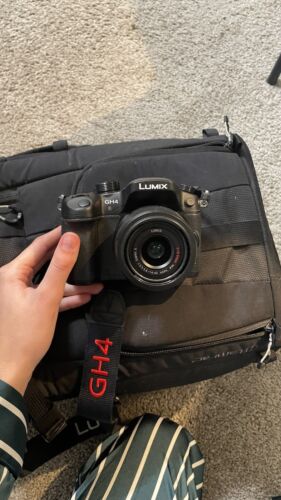 LUMIX Gh4 Camera With 14-42mm Lens + Tripod + Additional Battery + Storage Bag