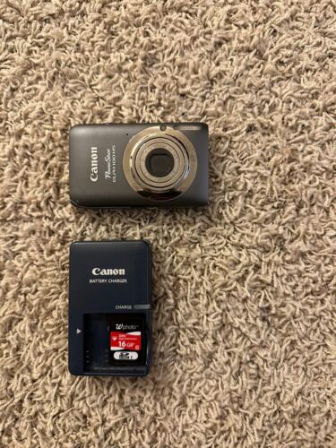 Canon PowerShot ELPH 100 HS 12.1MP Digital Camera Works Great W Charger And Sd