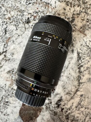 Nikon AF Nikkor 70-210mm F4-5.6 with Caps and L1Bc Filter