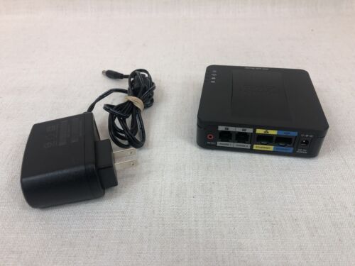 Cisco SPA122 ATA with Router 2 Port VOIP, Includes power adapter