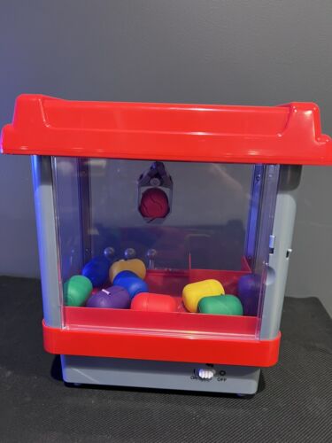 Electronic Arcade Claw Machine Toy with Plastic Egg Capsules – Tested