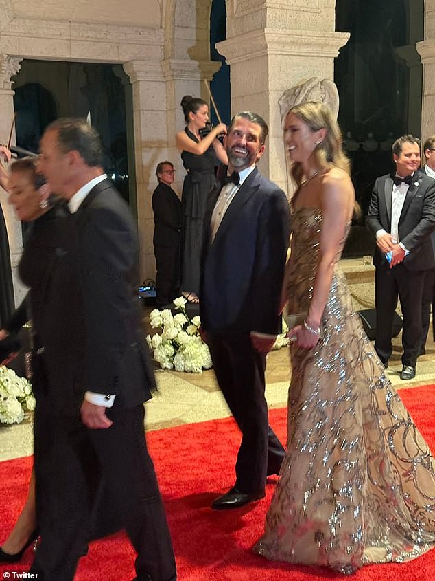 Don Jr. and his new girlfriend step out at Mar-a-Lago… as Trump speaks out on New Year’s Eve from his celebrity-packed Florida fortress