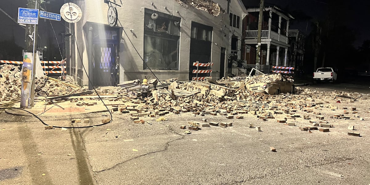 Building housing former New Orleans guitar shop partially collapses onto Magazine Street