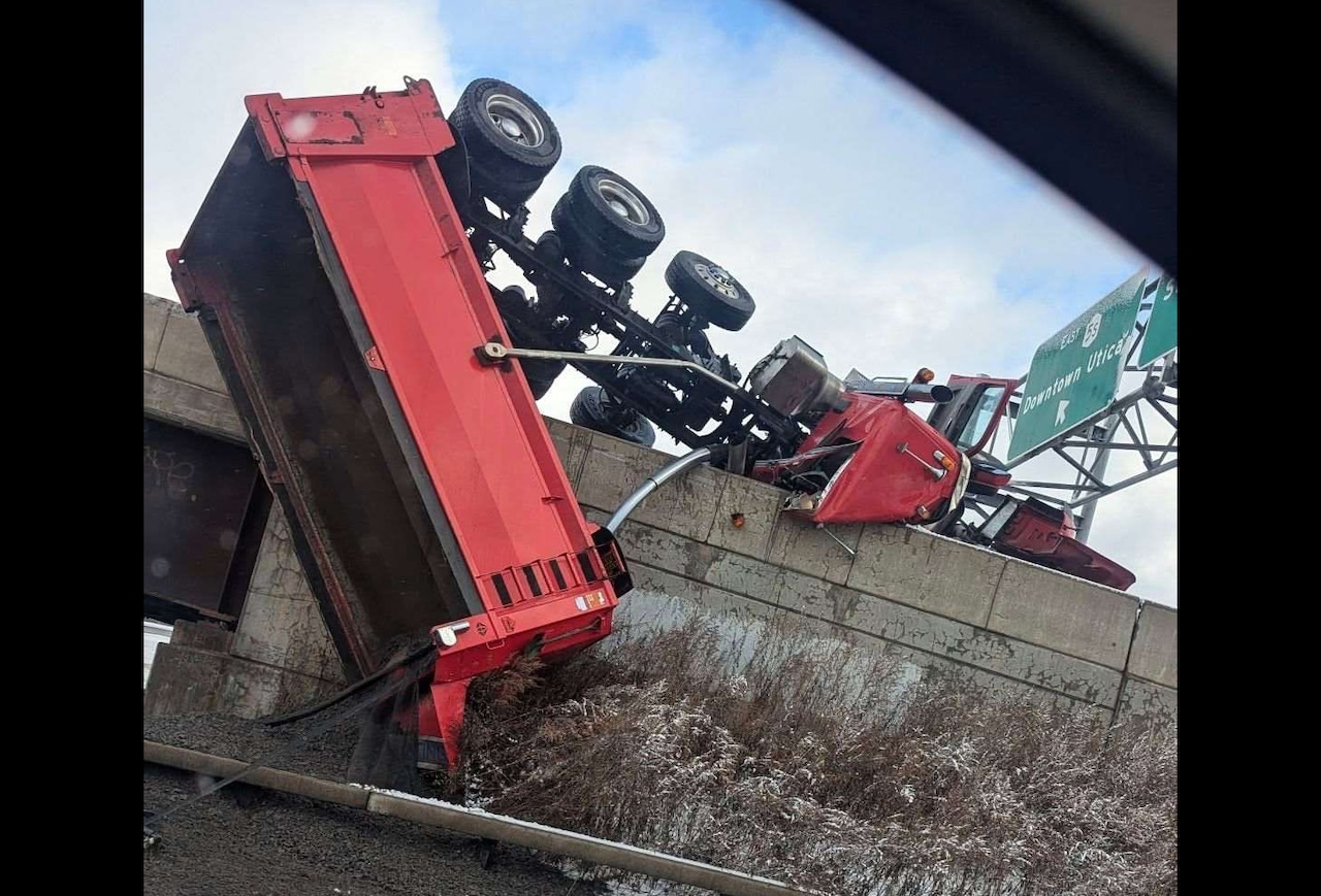 Utica declares snow emergency; dump truck rolls over highway ramp