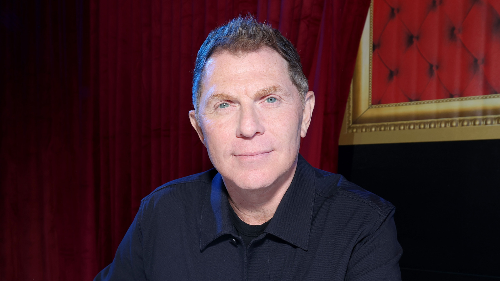 Why Bobby Flay Always Serves Food Family-Style When Cooking At Home